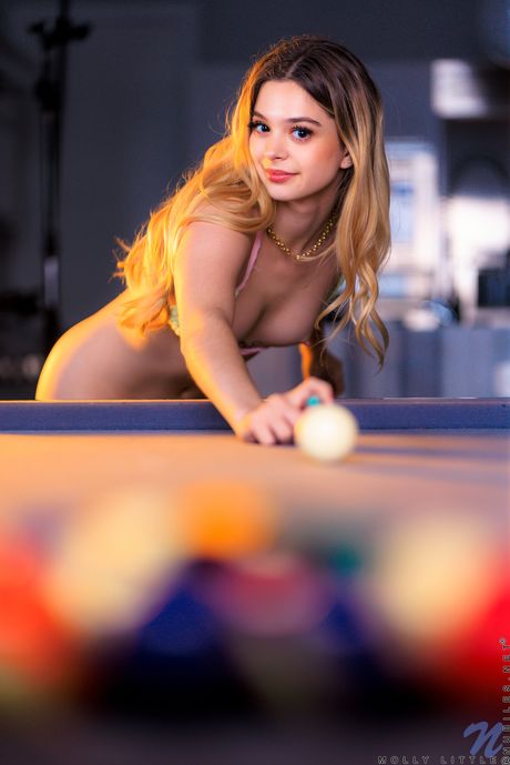 Cute teen Molly Little strips off her bikini before fingering her pussy