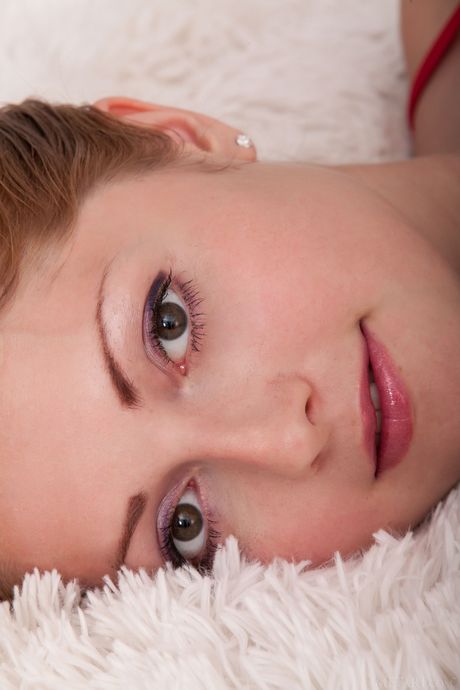 Amorett takes off her sexy lingerie and exposes her big tits and pussy