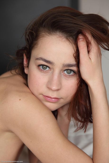 Skinny teen Tigra strips off her bikini and highlights her small tits & holes