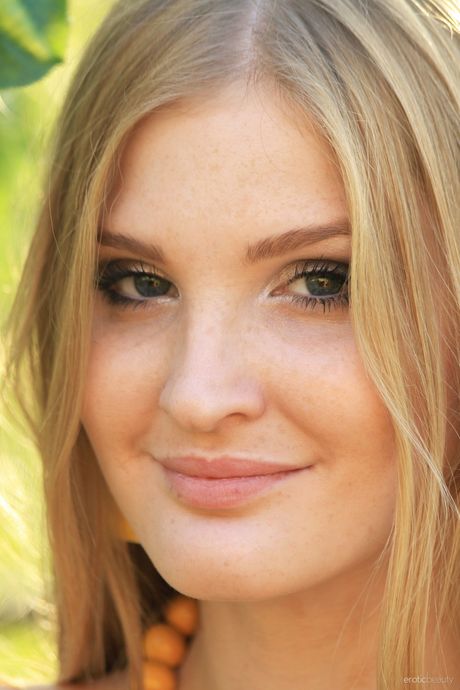 Charming teen Tinaa takes it all off on a balcony in a confident fashion