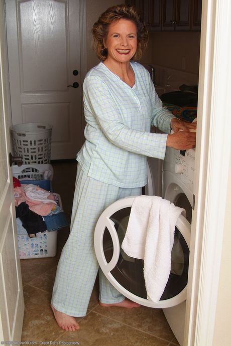 Mature housewife Judy shows off her big ass and hairy pussy