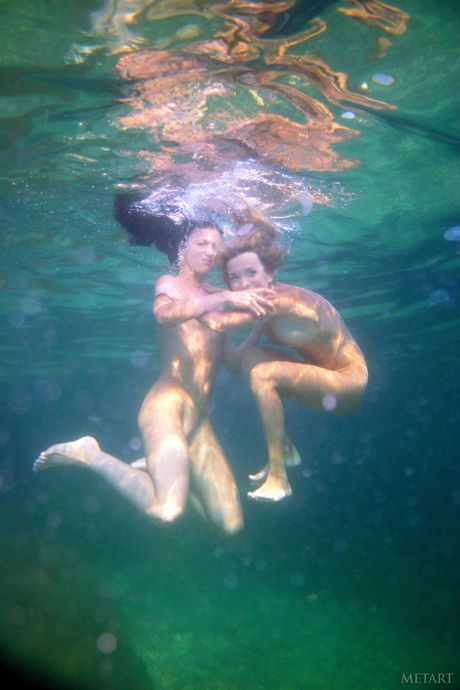Naked teen girls Kseniya B & Nicole B pose for a nude shoot in a river