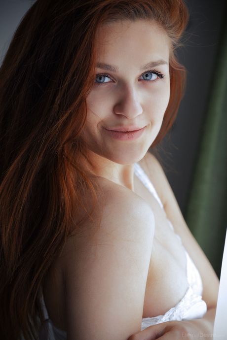 Stunning teen Barbora M removes a bodysuit to model in the nude