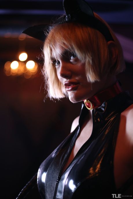 Blonde teen Kitty Cat gets naked in a dungeon setting with her teddy bear