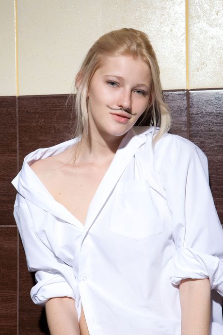 Ukrainian model Mila I gets naked and poses in the bathroom