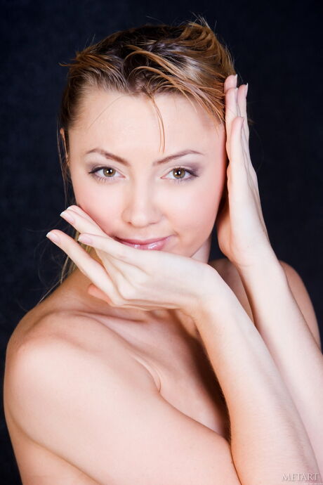 Blonde teen Jenna A removes her dress to pose nude without embarrassment