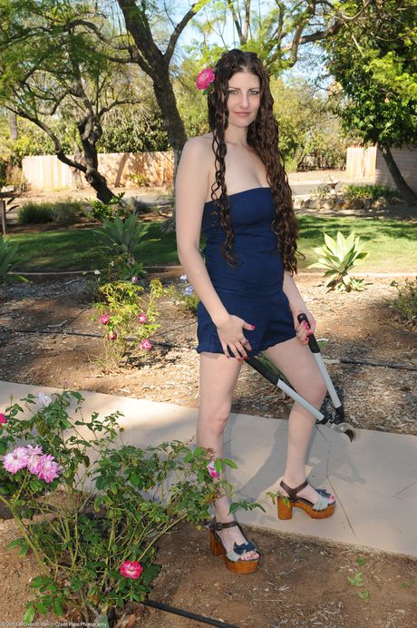 Mature blonde Sabrina Deep shows her big tits and spreads her pussy