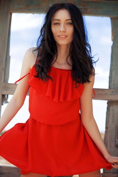 Delicate teen Zsanett Tormay strips & poses nude on a ladder in the garden