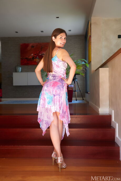 Cute teen Georgia gets nude on a sofa without hesitation