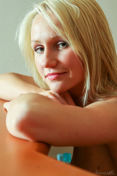 Blonde teen Vanessa S strikes great solo poses while completely naked