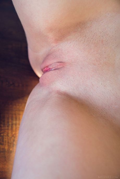 Sexy blonde Kery removes her lingerie to model naked in high heels