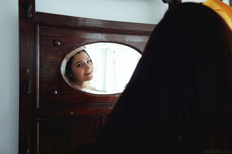 Sexy Ukrainian erotic model Hayli Sanders reveals her big tits and poses naked