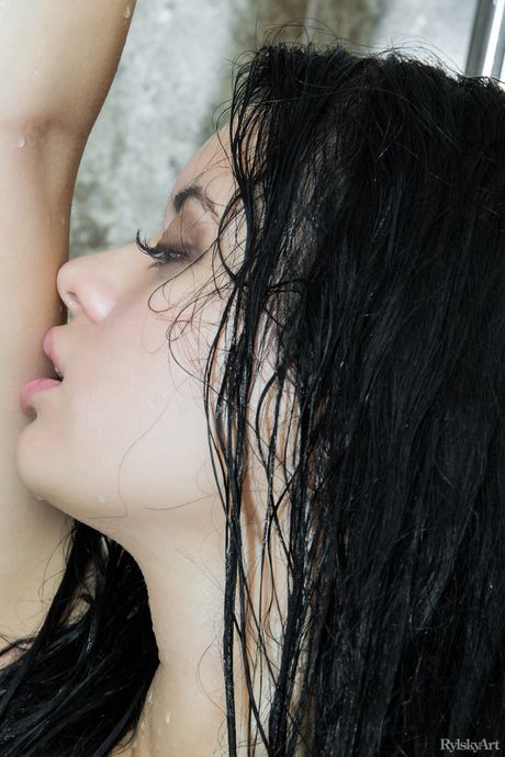 Charming teen Carmen Summer takes a shower while naked in a bathroom