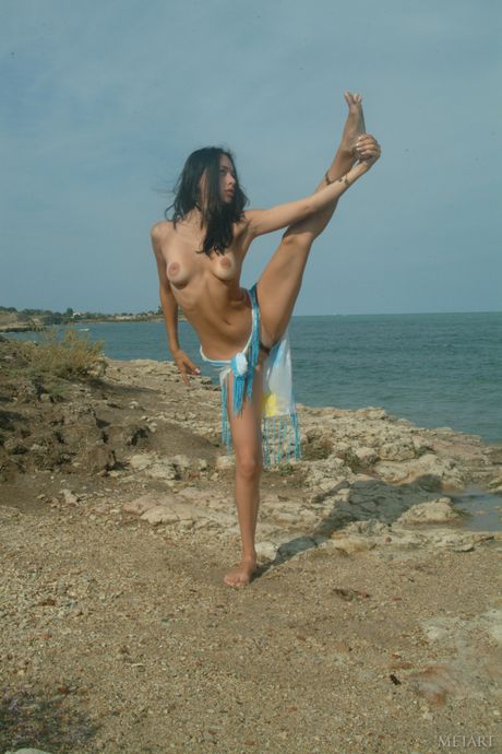 Ukrainian venus Selene A removes her bikini and boots to pose nude