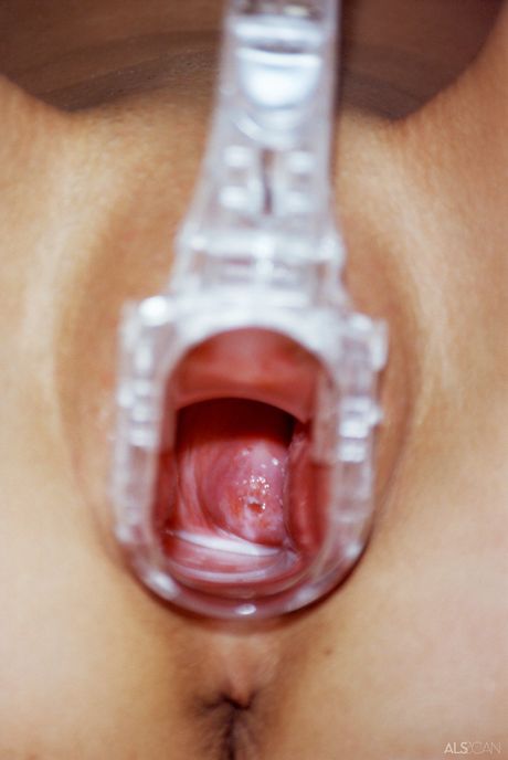 Lean teen Joanne strips and toys her shaved pussy in the kitchen