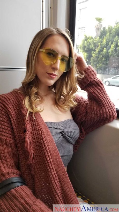 Blonde Cadence Lux exposes her big ass and poses in stockings in a solo