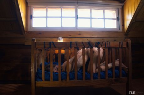 Lovely teen Gaia Sofia is bound in a crib while masturbating with a dildo