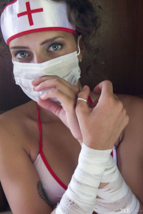 Nurse Jacinta B gets tied up in her sexy costume and panties