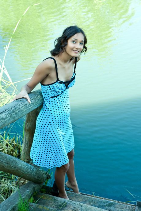 Lean teen Chandra A displays her tiny tits and hairy pussy