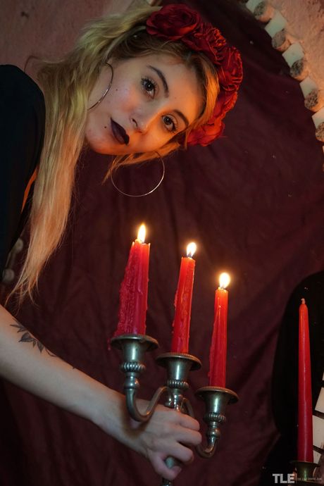 Sexy blonde Sophia D removes her lingerie and stockings to masturbate