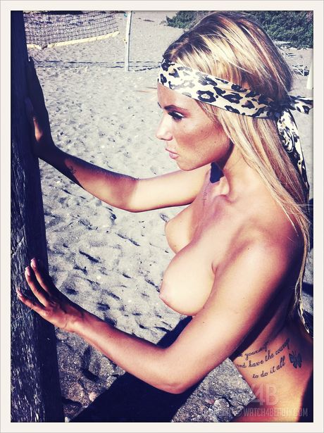 Hot blonde Ashley Bulgari shows off her big tits and pussy in the yard