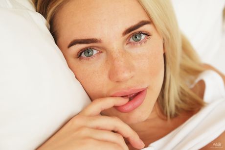 Innocent teen Likka fingers her pussy while naked on her bed