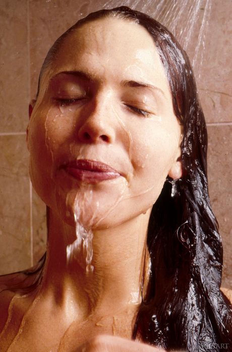 Attractive teen Erika B removes her lingerie before taking a shower