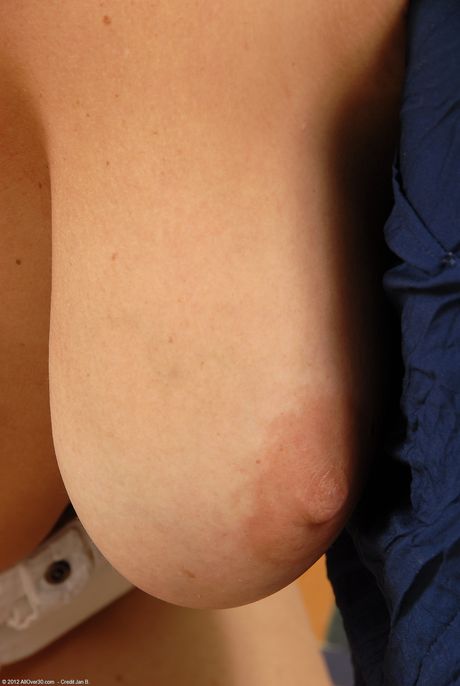 Chubby mature Ria Black shows her big ass and spreads her pussy