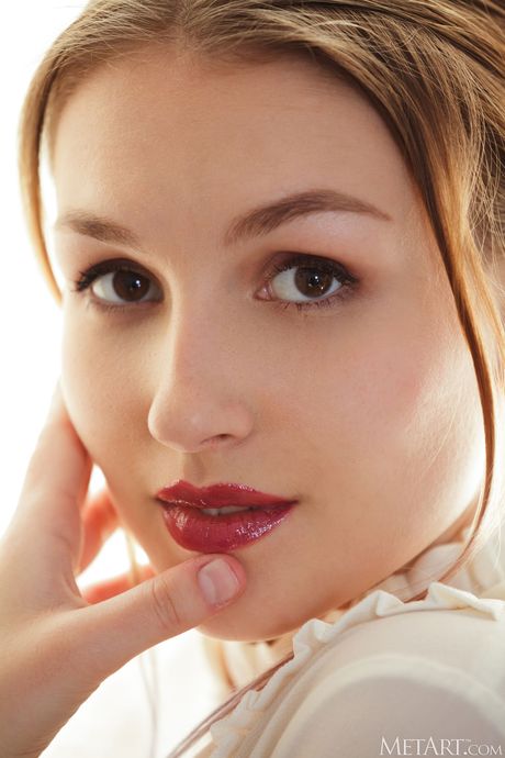 Isabele is a beautiful girl with long brunette hair