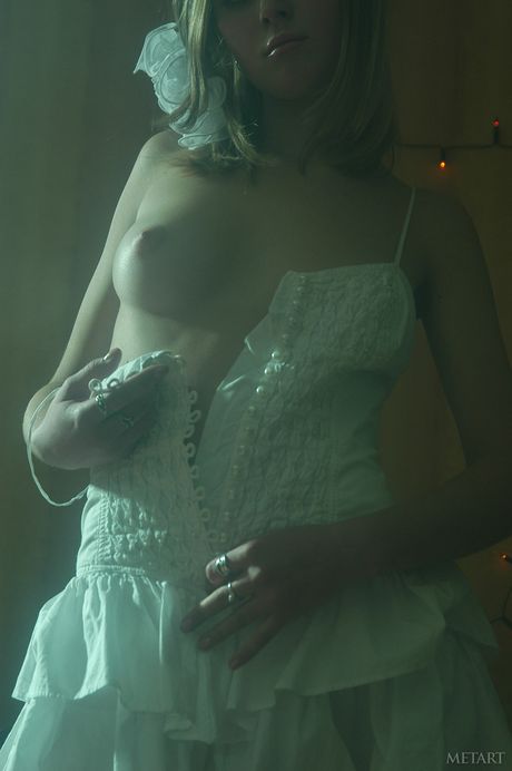 Ukrainian peach Cassandra A shows her big tits and poses in stockings