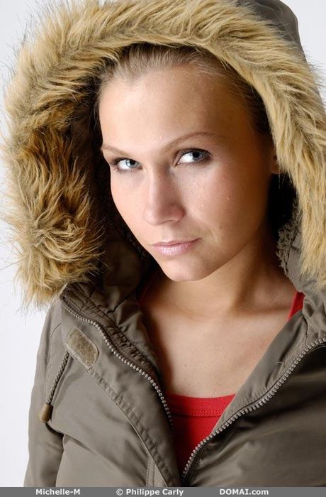 Blonde teen Tania G strips down in a confident fashion