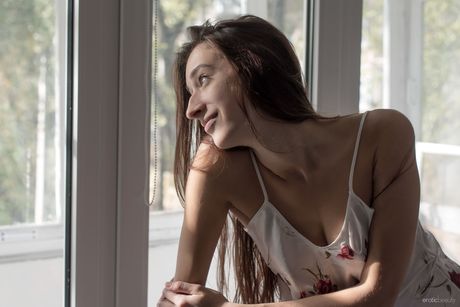 Precious teen Sugary removes her pajamas to pose naked on her bed