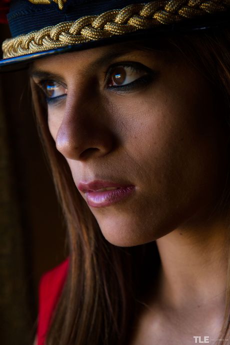 Charming teen Paloma D gets naked in a military cap while in a bathroom