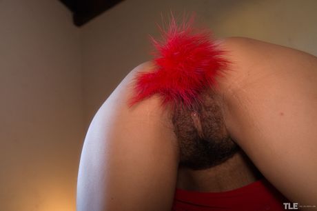 Charming teen Paloma D gets naked in a military cap while in a bathroom