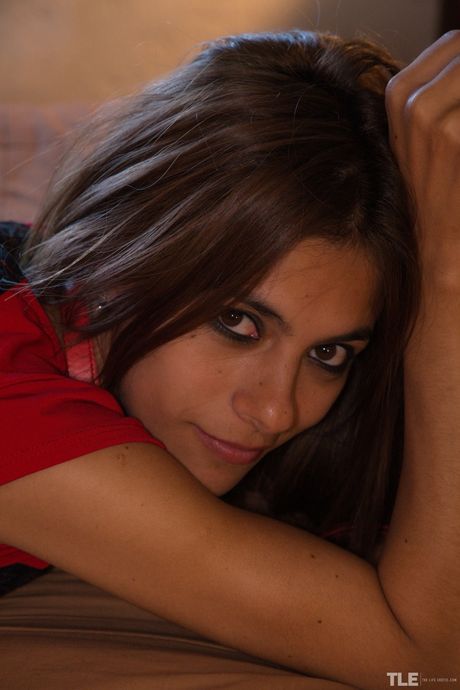 Charming teen Paloma D gets naked in a military cap while in a bathroom