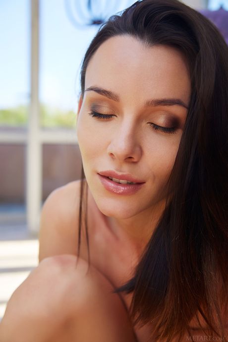 Sexy Ukrainian babe Adel Morel shows her big tits and poses naked