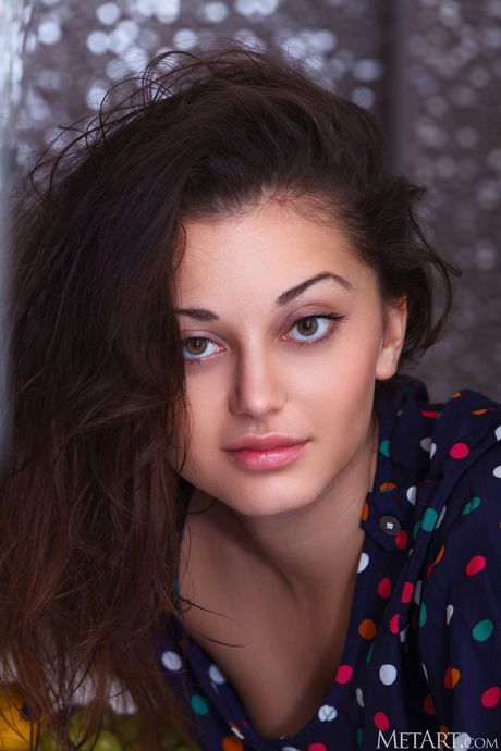 Cute teen Silvy takes off everything fearlessly on a kitchen counter