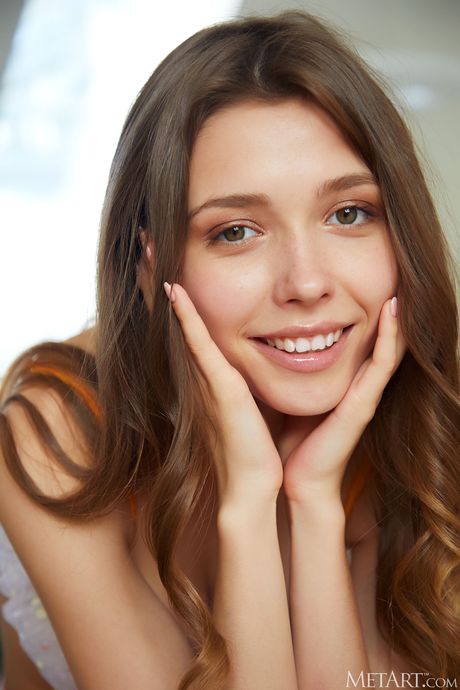 Ukrainian beauty Mila Azul gets naked with conviction in a solo shoot