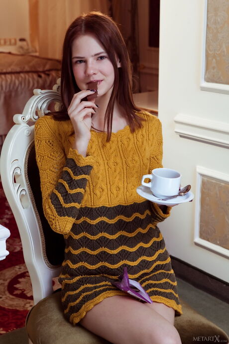 Ukrainian girl Juliett Lea fingers her pussy after getting naked in a solo