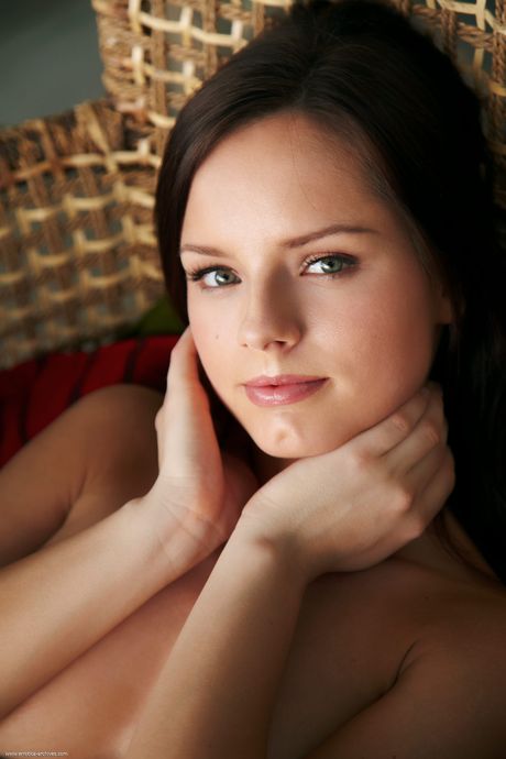 Engaging teen Dejana removes her clothes to model in the nude