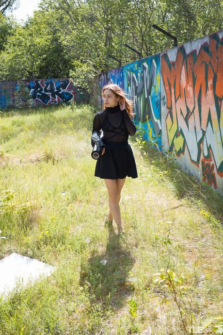 Young girl with long hair Raisa wraps herself in plastic wrap before masturbating