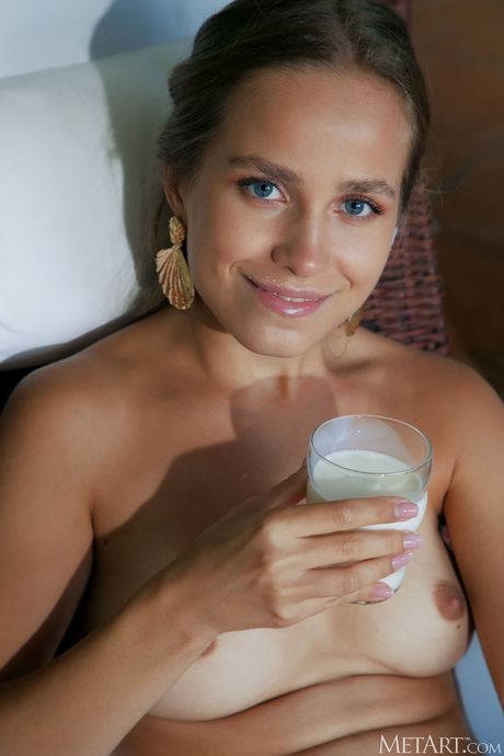 Precious teen Cassia removes mesh top and panties to get naked