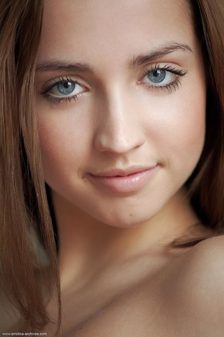 Charming teen Zara removes her bikini to pose nude with grace