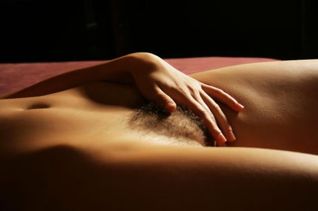 Angelic teen Kitty M removes her lingerie to pose nude in stockings