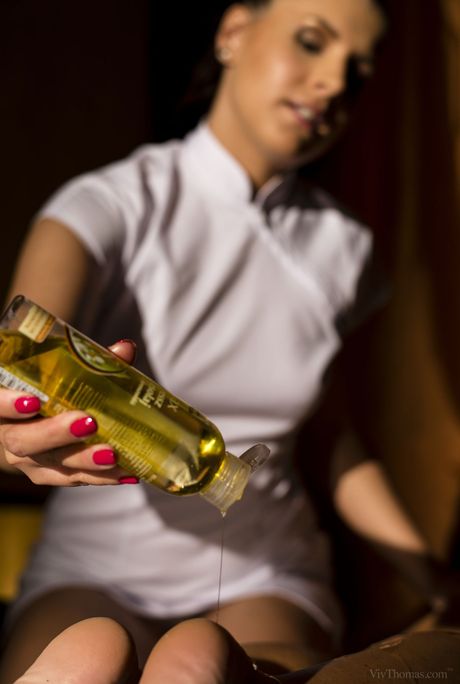 Hungarian teen Athina Love gets her pussy oiled and massaged by a lesbian