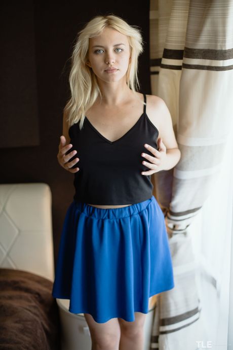 Pure teen Mary Lin removes her underwear before toying her pussy with a dildo