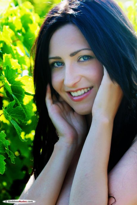 Naked girl Janelle B strikes great solo poses on a sandy beach