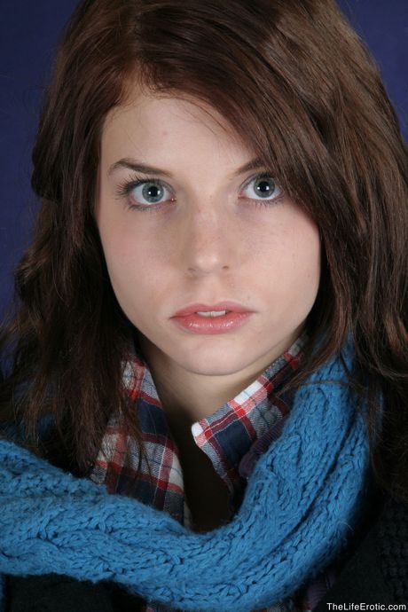 Bashful teen Diana removes her boots and clothes to pose nude in a solo