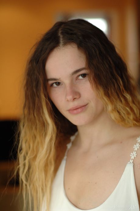 Young girl Harley bares it all in white stockings by herself