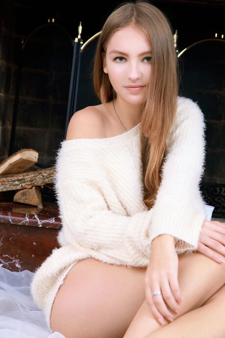 Ukrainian babe Izabel A reveals her big tits and poses